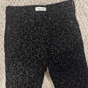 Straight leg size 27 Madewell black pants with velvet spot pattern.
